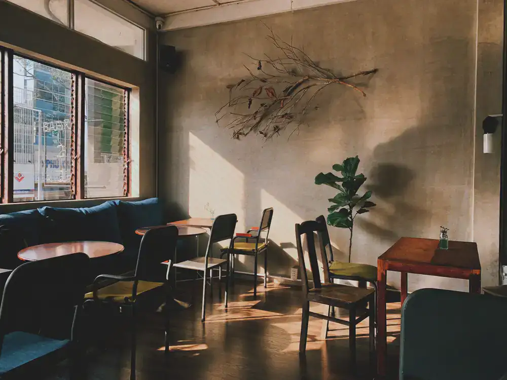 Spacious table setting inside the cafe with comfortable seating